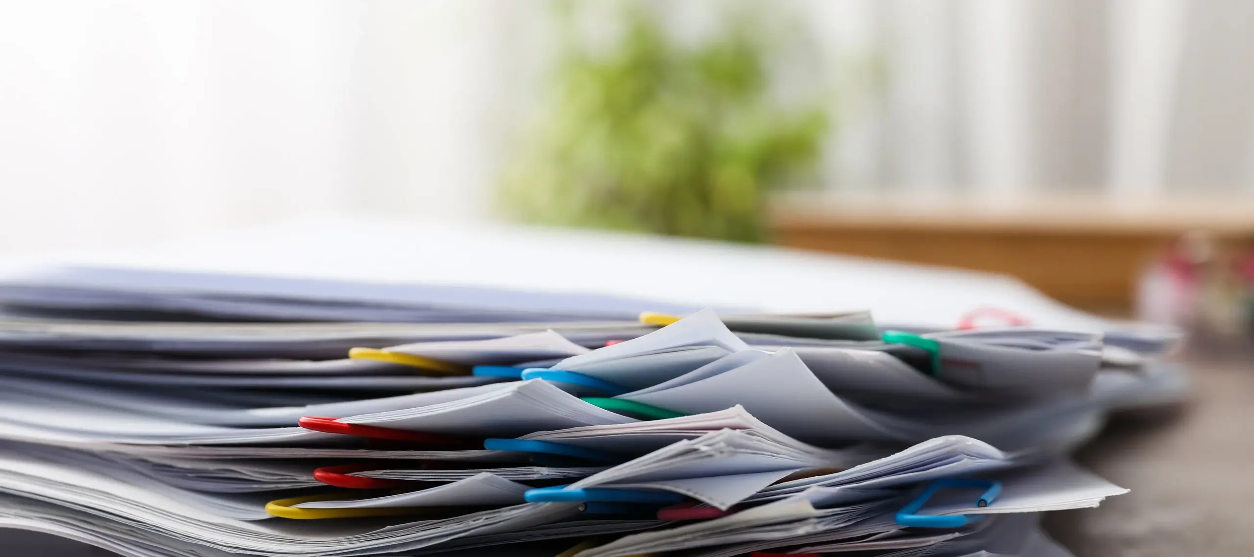 Concept of different office accessories - paper with clip